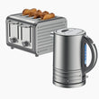 Grey Dualit toaster with bread slices and a matching silver kettle on a white background_thumb_1