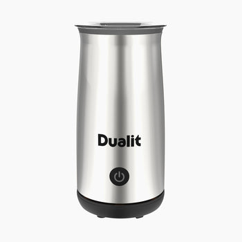 A tall, slender, orange Dualit brand hot chocolate maker and milk frother appliance with a power button on the front.