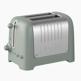 Green toaster with metallic finish on a white background_1